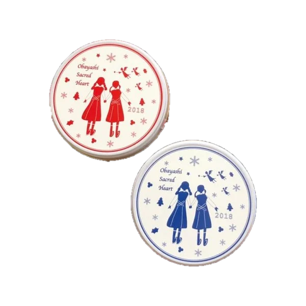 制服の女の子のシルエットを描いたお菓子の缶